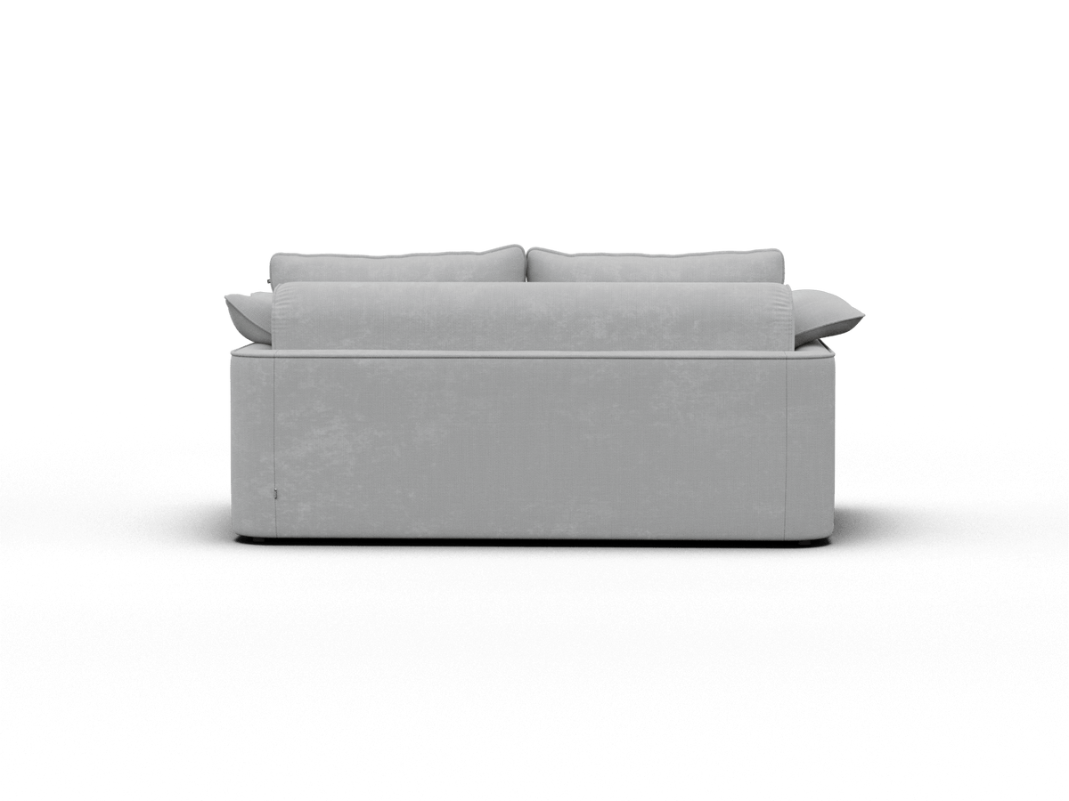 Luxurious grey sofa with clean lines in premium fabric, modern silhouette, plush back cushions. Ideal for minimalist interiors, perfecting contemporary settings.