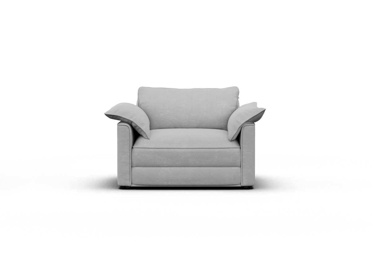 Modern grey armchair featuring plush fabric upholstery, wide cushioned arms, and a sleek silhouette. Perfect for a sophisticated living room setting.