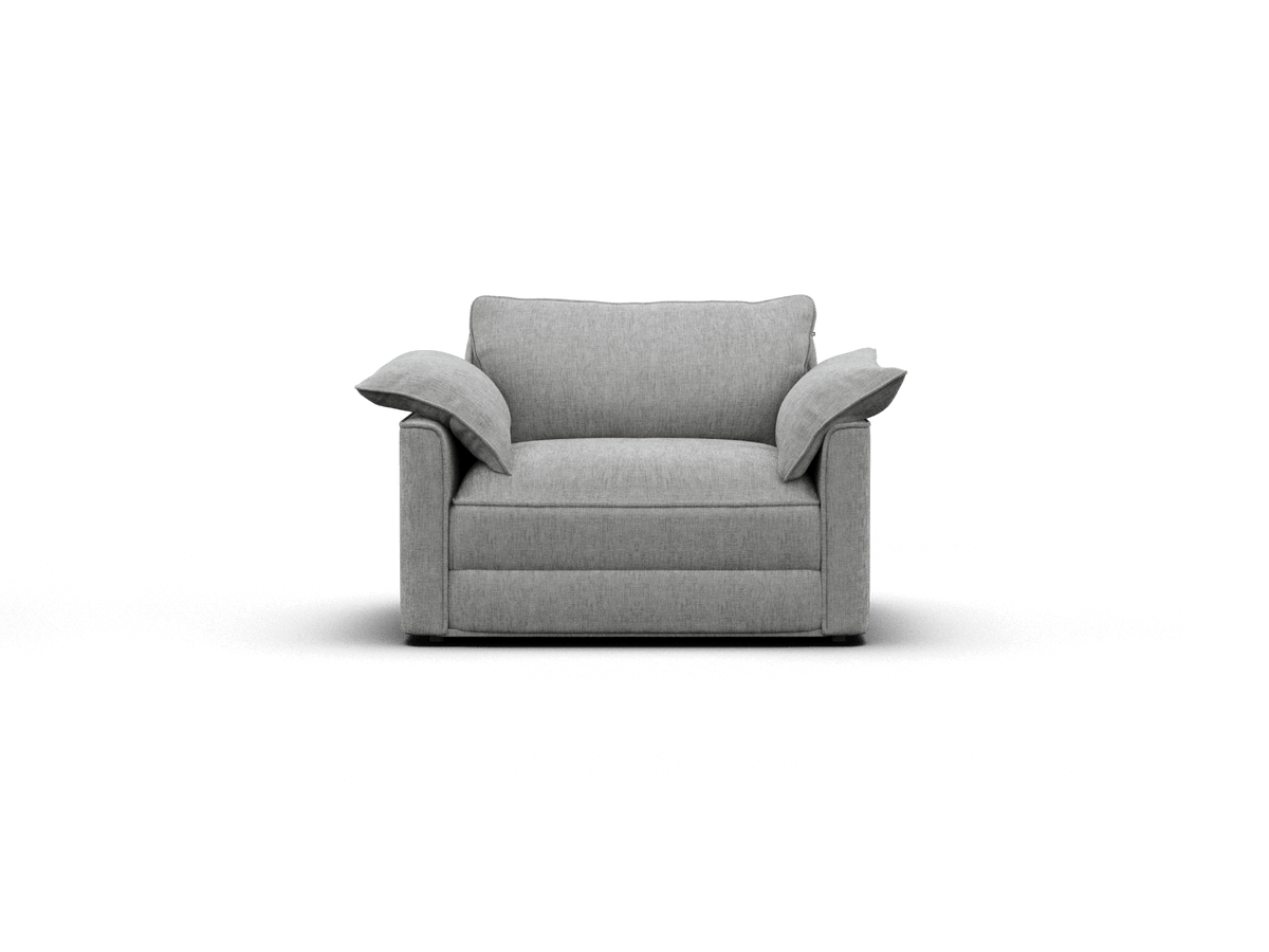 Modern grey fabric armchair with plush cushions and wide arms, set in a minimalist living space; perfect for contemporary Australian interiors.