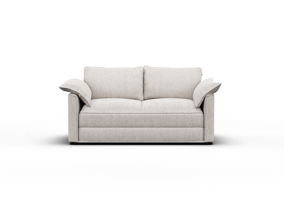 Elegant two-seater sofa in light grey fabric, featuring plush cushions and wide armrests, set in a contemporary, minimalist interior.
