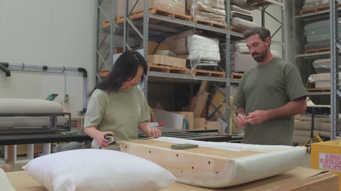 people designing and assembling sofa beds
