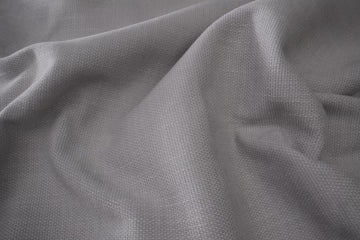 a beautiful light gray fabric showing its texture